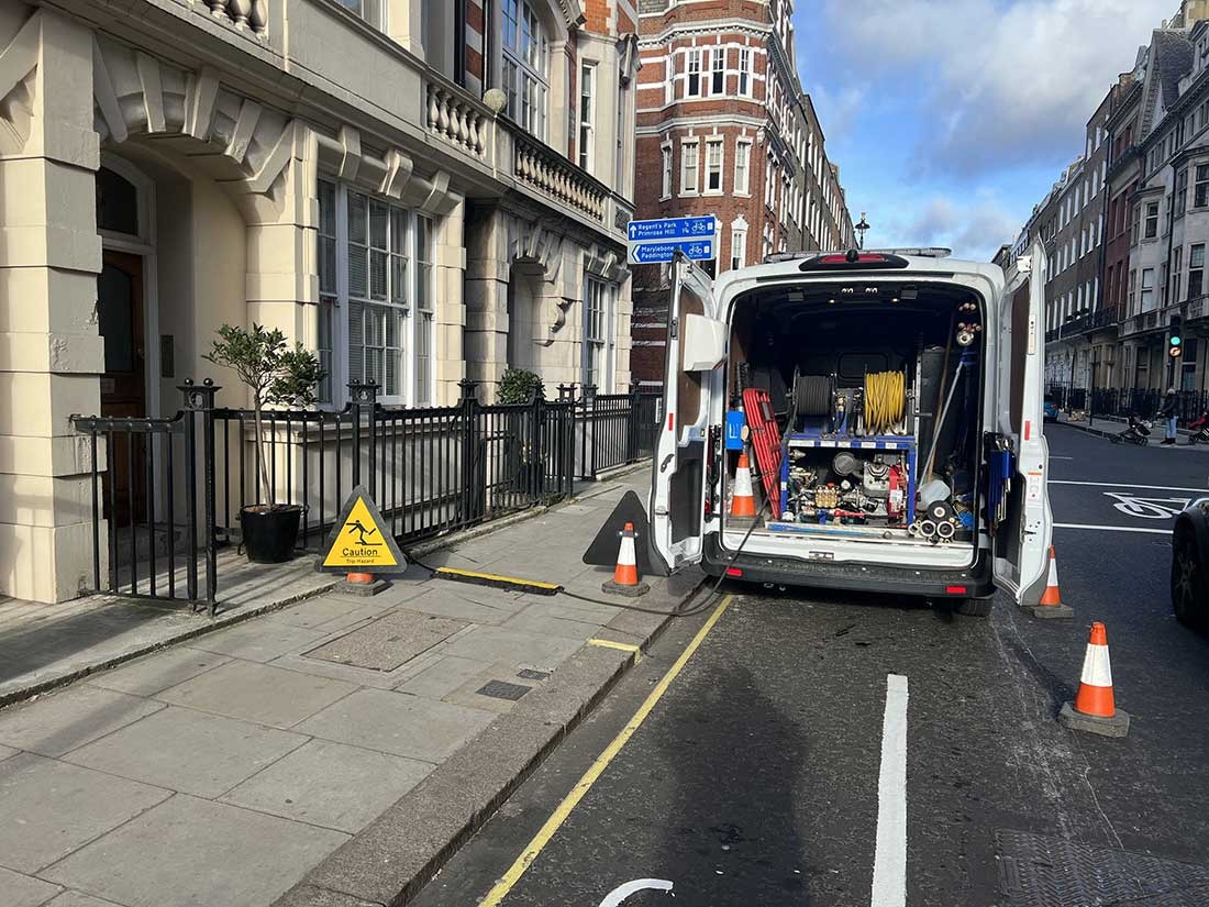 Overflow jet-vac van on a London drain-jetting job for a commercial client