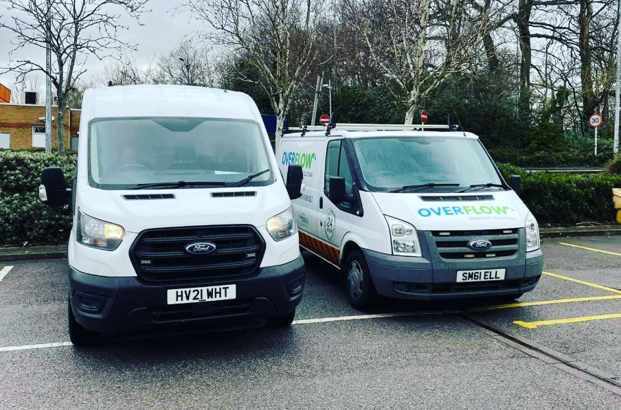 Two Overflow plumbing and drainage vans on site in Bracknell