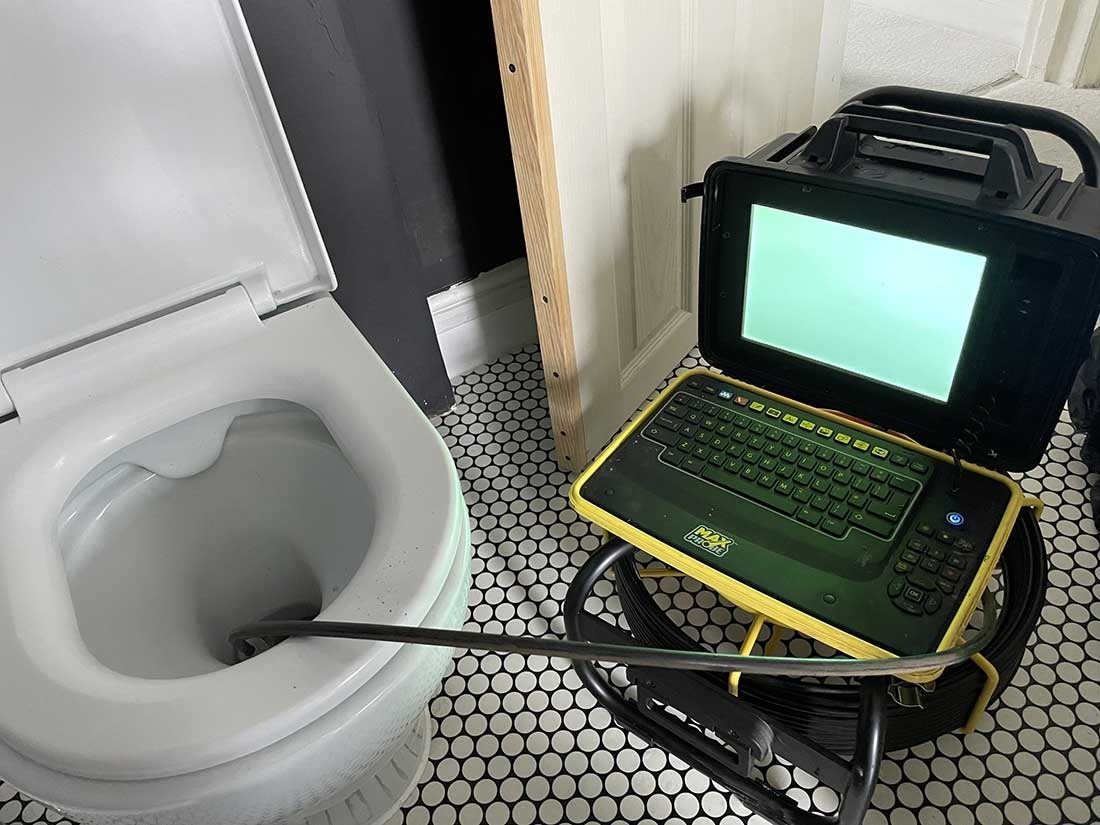 CCTV inspection probe entering a toilet pan during a Berkshire blocked drain investigation